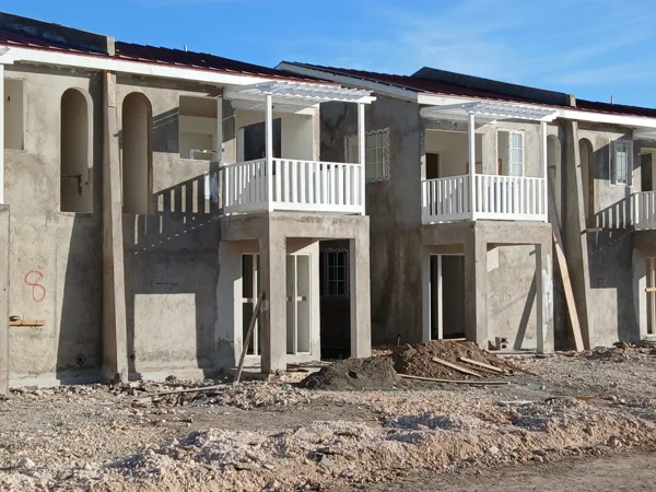 Front elevation with balcony and entrance works — HAJ Housing Development, 3 North, Portmore, St. Catherine