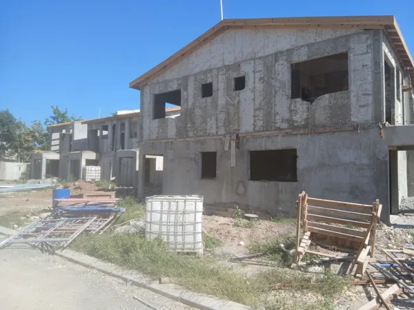 Two-storey building — side elevation — HAJ Housing Development, 3 North, Portmore, St. Catherine