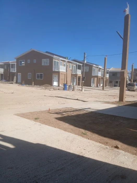 Painted housing units and external works — HAJ Housing Development, 3 North, Portmore, St. Catherine