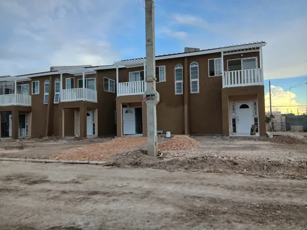 Housing units — façade finishes and balconies — HAJ Housing Development, 3 North, Portmore, St. Catherine